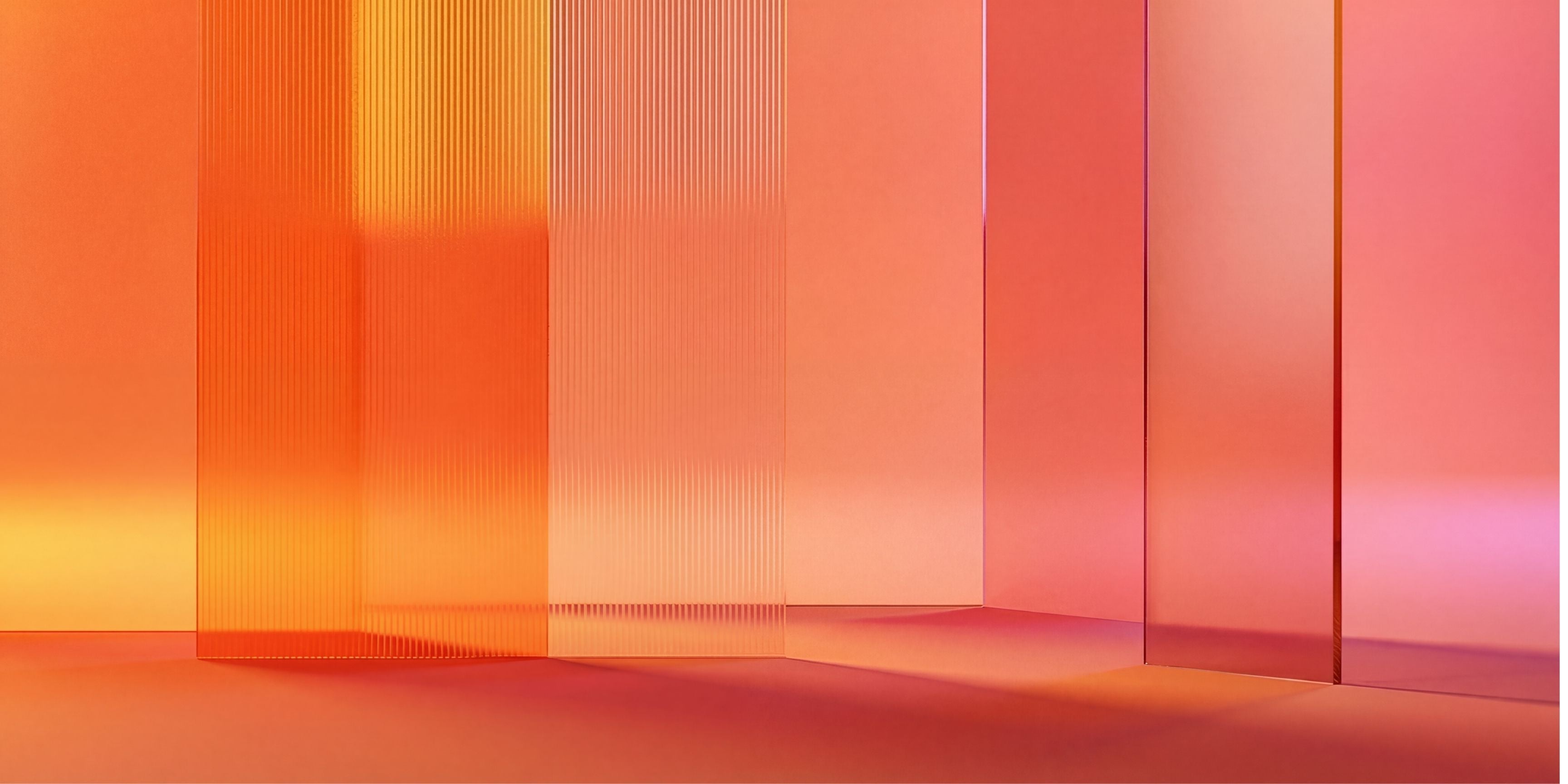 Gradient of orange and pink colors on a textured surface